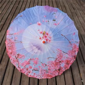 Ombrelle Sakura à fleurs roses sur fond bleu-violet